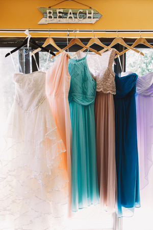 Way arrow hangs over charming pastel dressesの写真素材