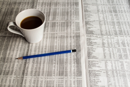 coffee and pencil on newspaperの写真素材