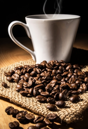 coffee bean on bag and coffee cup is aromaの写真素材