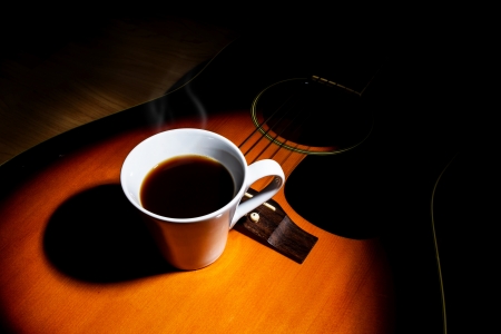 coffee on guitarの写真素材
