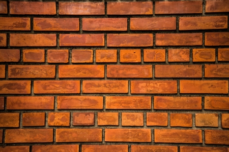 Brick wall texture in dark toneの写真素材