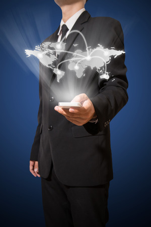 businessman hold digital world mapの写真素材