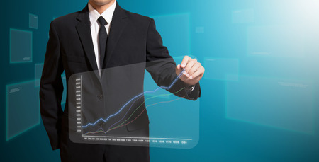 businessman analysis graph on screen high technologyの写真素材