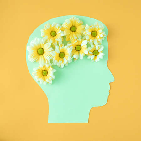 Man who has flower in his head like a brain. Lover of nature and flowers.の写真素材