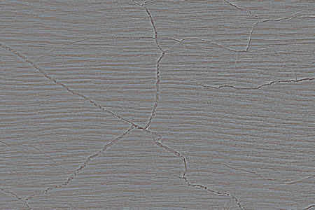 Cracked plywood surface background.