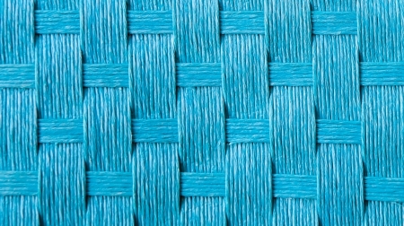 Closeup on blue straw cloth as backgroundの写真素材