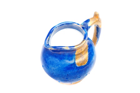 Blue milk jar isolated over white backgroundの写真素材