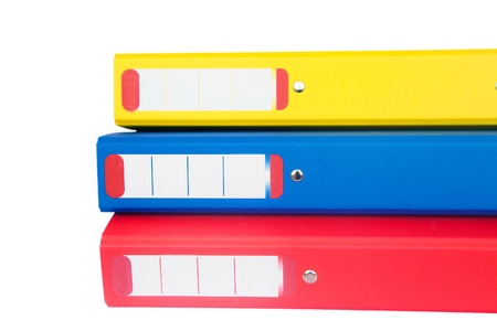 Three colorful folders isolated over white backgroundの写真素材