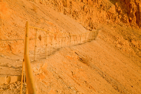 Fragment of a bannister on the mountain ascend to the Massada Fortress (Israel)の写真素材