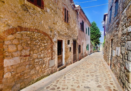 A picture of a medieval street in an old Tuscan villageの写真素材
