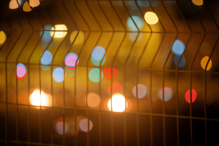 Abstract blurred background with large colorful bright bokeh spotsの写真素材