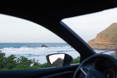 View of a beach from inside a car. Almaciga beach in Tenerifeの写真素材