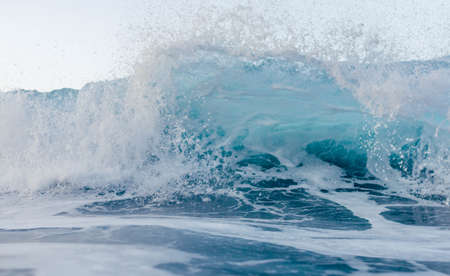 Small wave breaking in front of the cameraの写真素材