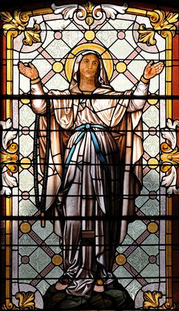 Catholic stained glass window from a church of the north of Serbiaのeditorial素材