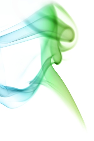 Blue and green smoke on white backgroundの写真素材
