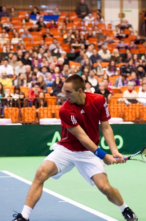 NOVI SAD, SERBIA - MAR 6 : Serbia tennis player, singles ranking 12 Viktor Troicki during his Davis Cup, 2011 World Group singles match vs. Somdev Devvarman, Marth 6, 2011 in Novi Sad, Serbia のeditorial素材