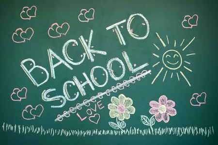 Back to school chalkboard. Green chalk blackboard written Back To School with white chalk. の写真素材