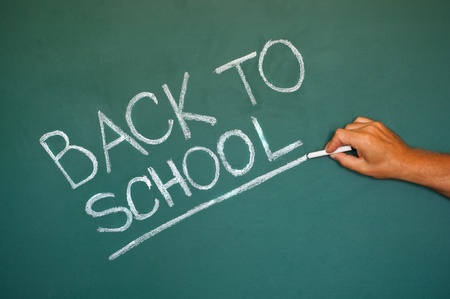 Back to school chalkboard. Green chalk blackboard written Back To School with white chalk.の写真素材