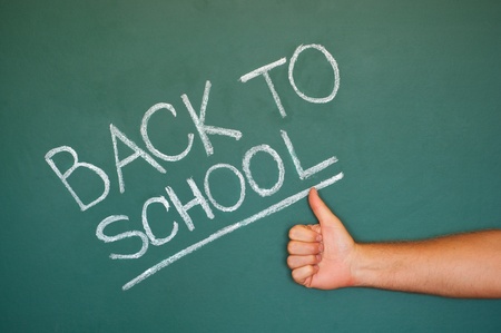 Back to school chalkboard. Green chalk blackboard written Back To School with white chalk.の写真素材