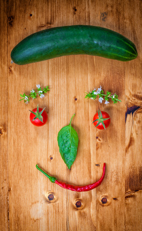 Healthy Organic Vegetables on a Wooden Background  Art Smiley Designの写真素材