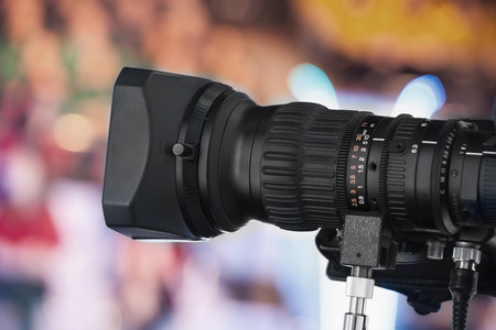 Video camera lens - recording show in TV studio - focus on camera apertureの写真素材