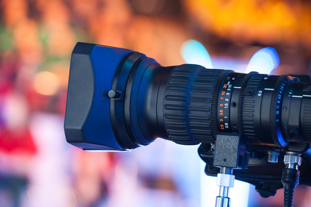 Video camera lens - recording show in TV studio - focus on camera apertureの写真素材