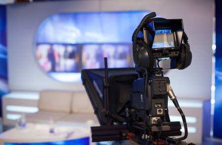 Video camera - recording show in TV studio - focus on cameraの写真素材