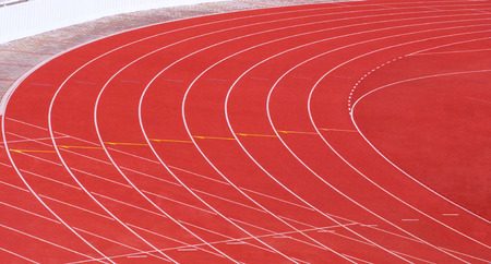 stadium track and field area empty on a sunny dayの写真素材