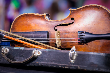 Vintage old used violin and bow. Shallow Depth of fieldの写真素材