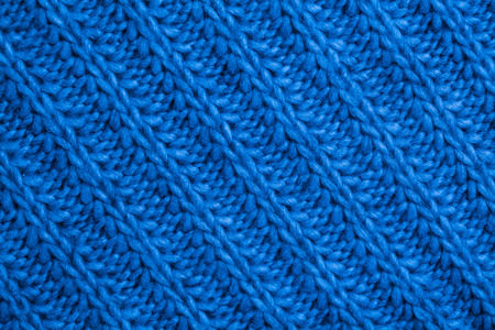 Closeup macro texture of knitted wool fabric, May use as background.の写真素材