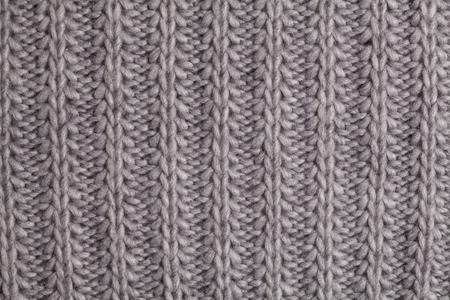 Closeup macro texture of knitted wool fabric, May use as background.の写真素材