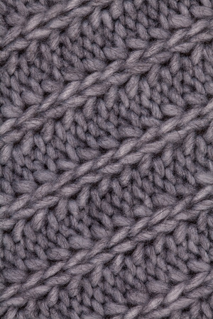 Closeup macro texture of knitted wool fabric, May use as background.の写真素材
