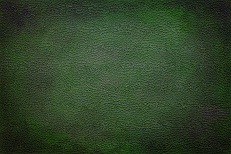 Old vintage green leather texture closeup can be used as backgroundの写真素材