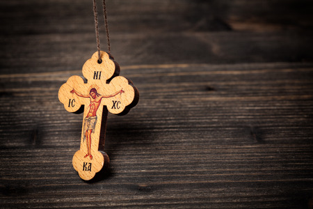 Closeup picture of small wooden christian crossの写真素材