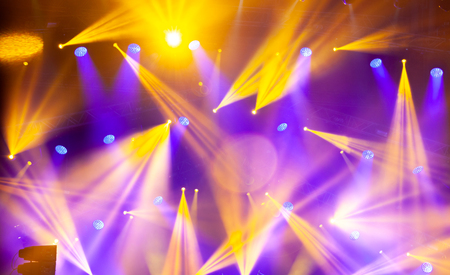 Stage lights on concert. Lighting equipment with multi-colored beams.の写真素材