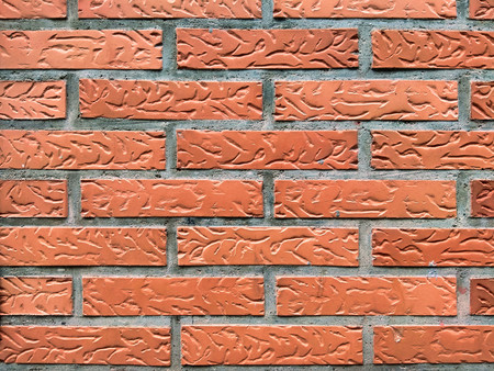 Orange brick wall background textureの写真素材