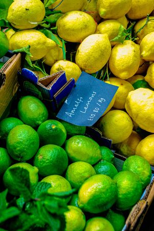 Colorful Lemons and limes on a London street marketの写真素材