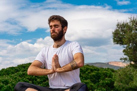 Mindfulness Yoga session on rooftop during the quarantine. Prayer Namaste.の写真素材