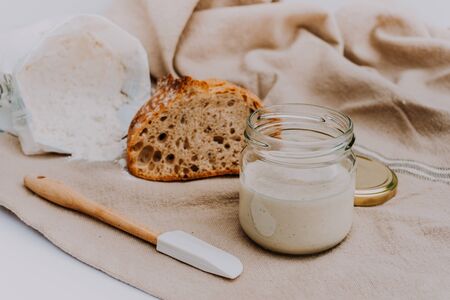 Active sourdough for homemade bread. Wheat and rye bio-wholemeal bread with leaven. Real and organic food concept. Homemade Bread. Ecologicの写真素材