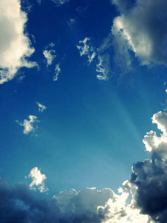 amazing blue sky with perfect white cloudsの写真素材