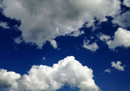 amazing blue sky with perfect white cloudsの写真素材