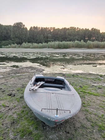 An old boat near the river