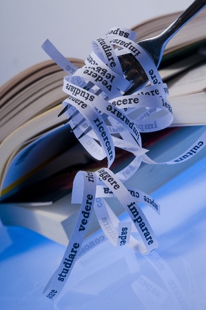 a fork holding spaghetti made up by wordsの写真素材