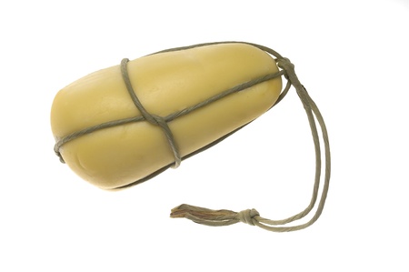 italian provola cheese isolated on white backgroundの写真素材