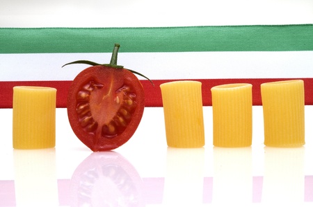 italian flag with pasta and tomatoeの写真素材