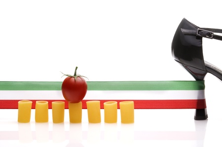 woman shoe with italian flag and pasta with tomatoeの写真素材