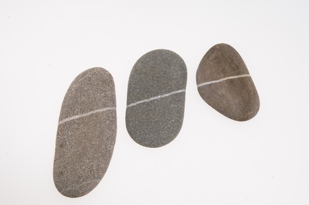 three stones with white stripeの写真素材