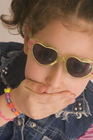 young girl with sunglassesの写真素材