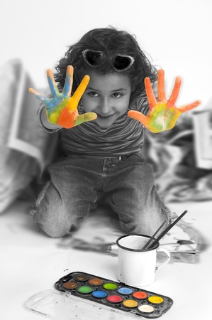 cute girl with hands paintedの写真素材