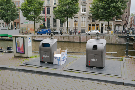 Recycling station on the Prinsengracht. Here locals can bring their waste and recycle. Amsterdam, August 13th 2016 the Netherlandsのeditorial素材